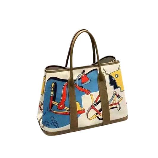 Hermes Garden Party Voyage Bag in a colorful print with olive leather
